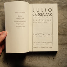 Load image into Gallery viewer, Blow-Up And Other Stories
 ร้านหนังสือและสิ่งของ เป็นร้านหนังสือภาษาอังกฤษหายาก และร้านกาแฟ หรือ บุ๊คคาเฟ่ ตั้งอยู่สุขุมวิท กรุงเทพ