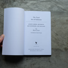 โหลดรูปภาพลงในเครื่องมือใช้ดูของ Gallery The Total Art of Stalinism | Boris Groys
 ร้านหนังสือและสิ่งของ เป็นร้านหนังสือภาษาอังกฤษหายาก และร้านกาแฟ หรือ บุ๊คคาเฟ่ ตั้งอยู่สุขุมวิท กรุงเทพ