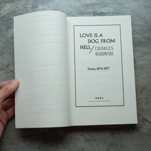 Load image into Gallery viewer, Love Is a Dog from Hell  | Charles Bukowski
 ร้านหนังสือและสิ่งของ เป็นร้านหนังสือภาษาอังกฤษหายาก และร้านกาแฟ หรือ บุ๊คคาเฟ่ ตั้งอยู่สุขุมวิท กรุงเทพ