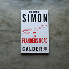 Load image into Gallery viewer, The Flanders Road | Claude Simon
ร้านหนังสือและสิ่งของ เป็นร้านหนังสือภาษาอังกฤษหายาก และร้านกาแฟ หรือ บุ๊คคาเฟ่ ตั้งอยู่สุขุมวิท กรุงเทพ