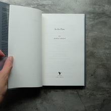 Load image into Gallery viewer, In the Flow
 ร้านหนังสือและสิ่งของ เป็นร้านหนังสือภาษาอังกฤษหายาก และร้านกาแฟ หรือ บุ๊คคาเฟ่ ตั้งอยู่สุขุมวิท กรุงเทพ