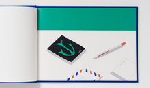 Load image into Gallery viewer, ON THE TABLE 安西水丸
 ร้านหนังสือและสิ่งของ เป็นร้านหนังสือภาษาอังกฤษหายาก และร้านกาแฟ หรือ บุ๊คคาเฟ่ ตั้งอยู่สุขุมวิท กรุงเทพ